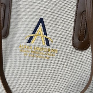 Amélie Bag – Bolsa Feminina Estruturada em Tecido com Detalhes em Couro